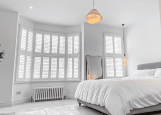 Designed to fit the angles and curves of bay windows, enhancing the shape while controlling light and privacy.