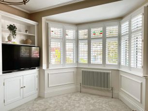 Designed to fit the angles and curves of bay windows, enhancing the shape while controlling light and privacy.